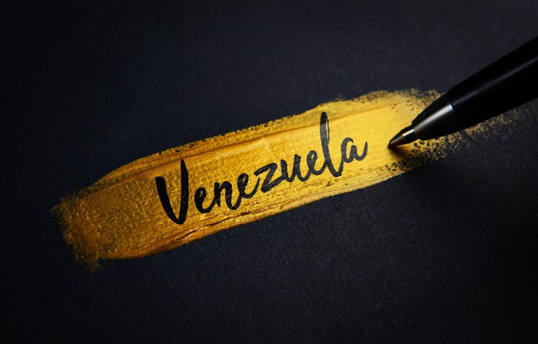 venezuela-handwriting-text-on-golden-paint-brush-stroke.jpg