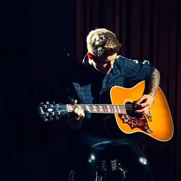 justinbiebermakingmusicselenagomezftr.webp