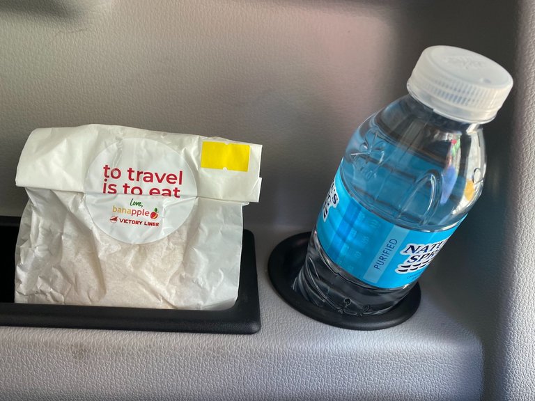 Pastry from Banapple (empanada) and a bottled water.  This used to be the snacks offered in First Class.  But they've downgraded it into some biscuit/bread now that they offer this in Royal Class.  I think they could have offered something better.