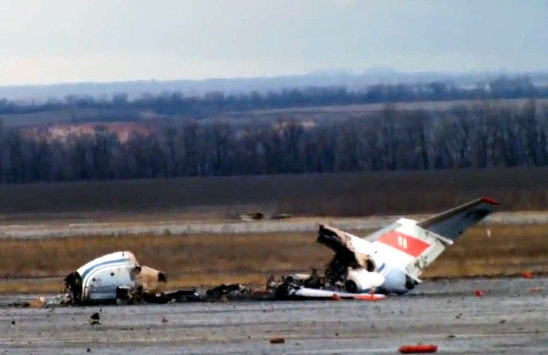 Wrecked plane on the runway. Photo Source - Wikimedia