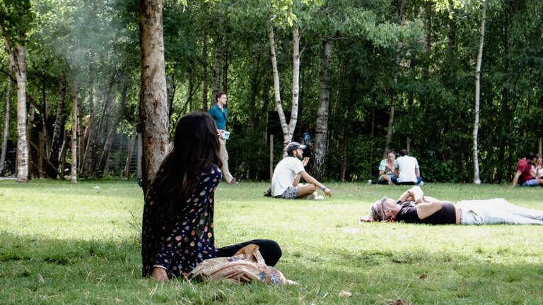 People chilling sitting on the grass.jpg