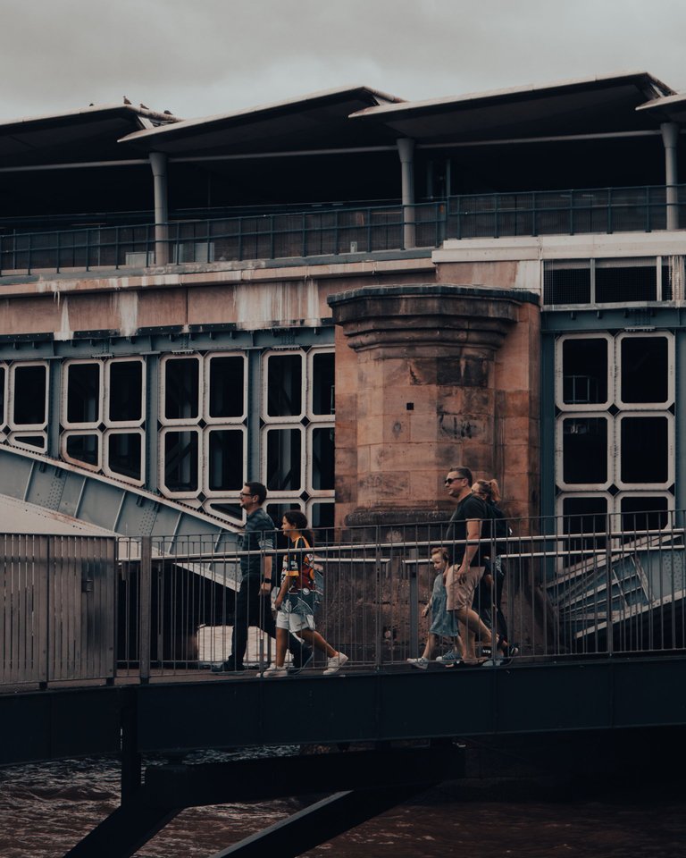 Family walking over a bridge.jpg