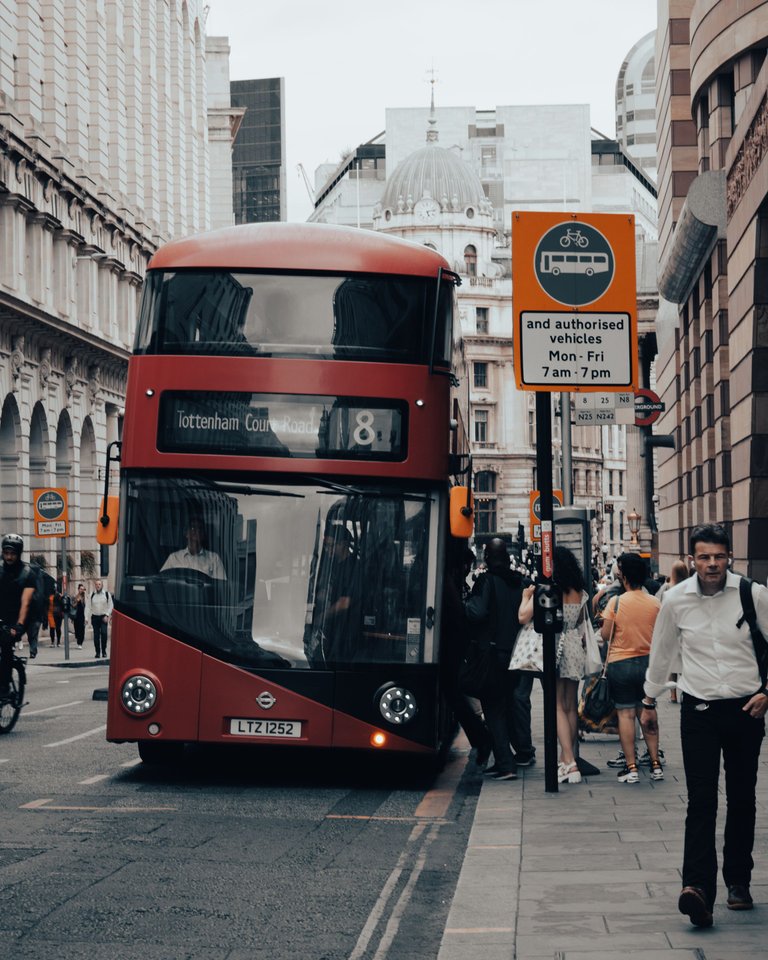 Red double decker bus on the bus stop.jpg