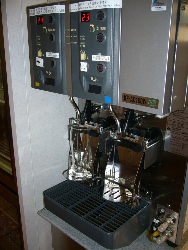 706.1 - First put the glass on the machine and push the button.