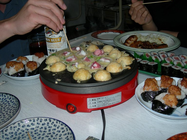 667 - Title of this photo: 'The Takoyaki Professionals'. This is a long story because most of the pictures have our faces in them. If you know the secret web link, you'll be able to glean more info. But for those of you who are interweb-only friends, find the story below.