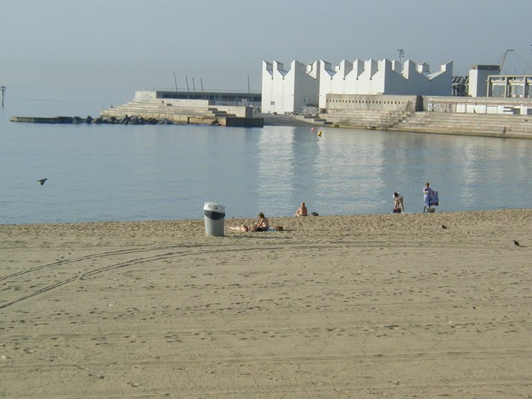 094-Topless sunbathers at Barcelona Playa Espanya.JPG