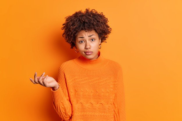 horizontal-shot-confused-hesitant-young-afro-american-woman-shrugs-shoulders-looks-perplexed-doubtful-looks-unconfident_273609-46058.jpg