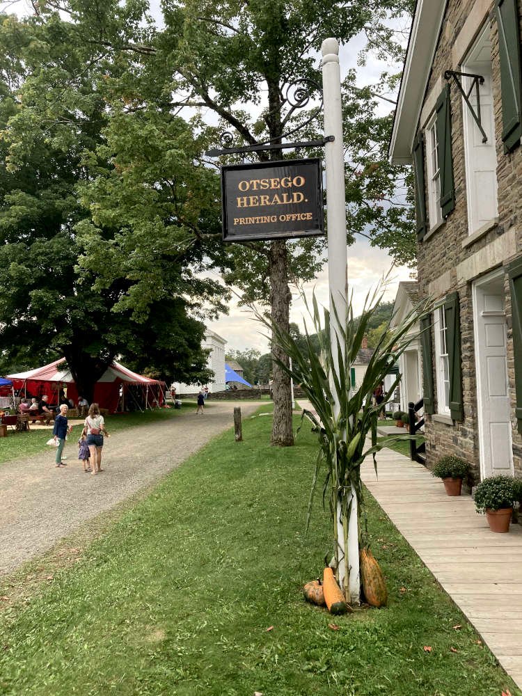 The wooden sidewalks pass buy shops that the re-enactors run just as they had been in the past. Sometimes they print the actual signs and papers used by the museum at this print shop.