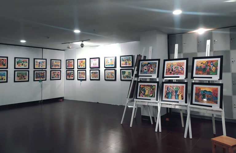 Area displaying children's paintings made by child artists