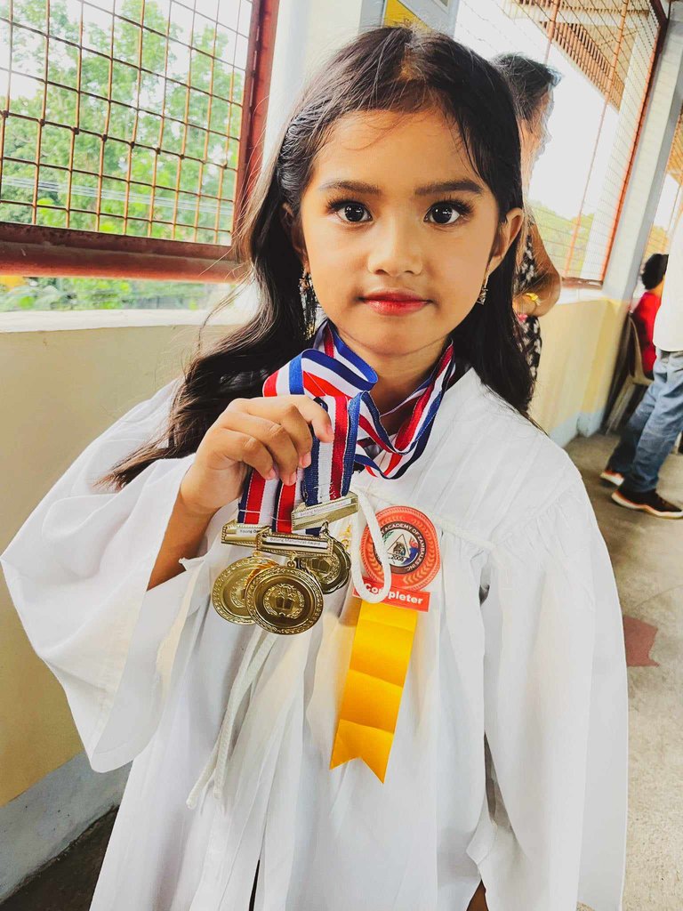 gia with medal.jpg