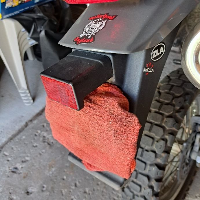 All the black fender gets removed up to the gray fender that houses the brake light.