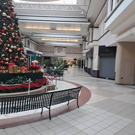 A boarded up jewelry store and an empty mall.