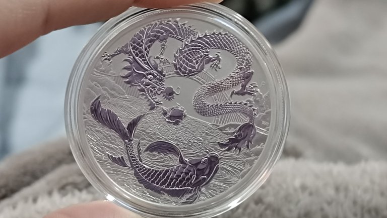 The Missing Myths & Legends Silver Round: Dragon & Koi 1 oz 2023