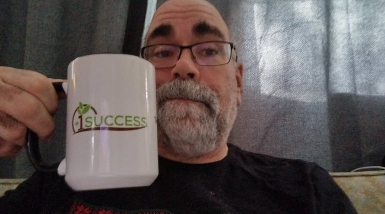 rob-with-cup.jpeg