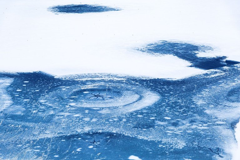 Frozen-lake-ice-patterns-winter-wonderland.jpg