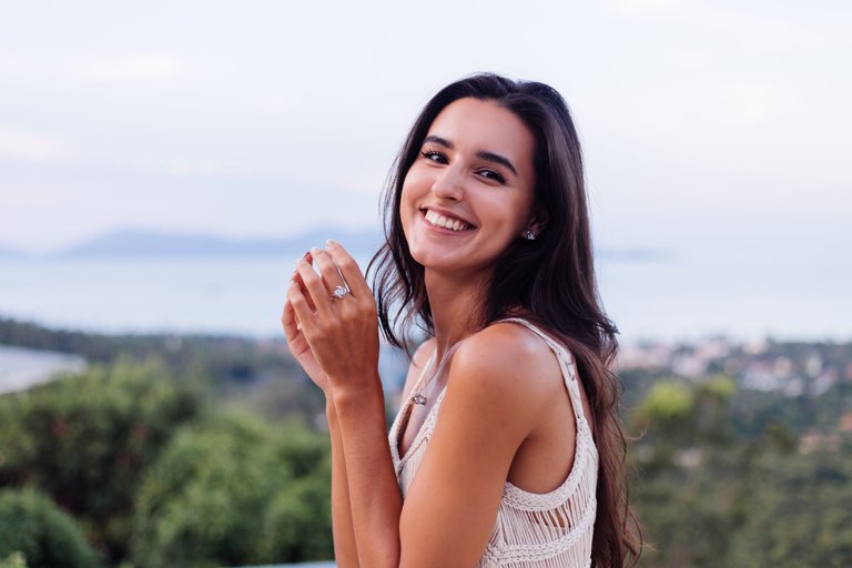 portrait-happy-caucasian-calm-romantic-woman-casual-look-with-long-hair-wearing-earings-necklace-background-amazing-beautiful-view-green-mountains.jpg