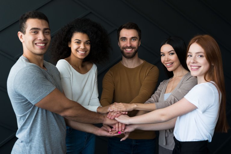 front-view-group-young-people-holding-hands.jpg