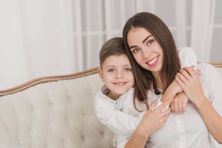 adorable-young-boy-holding-his-mom.jpg