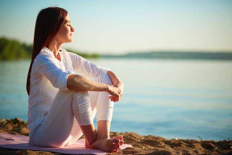 relaxed-woman-enjoying-sea.jpg