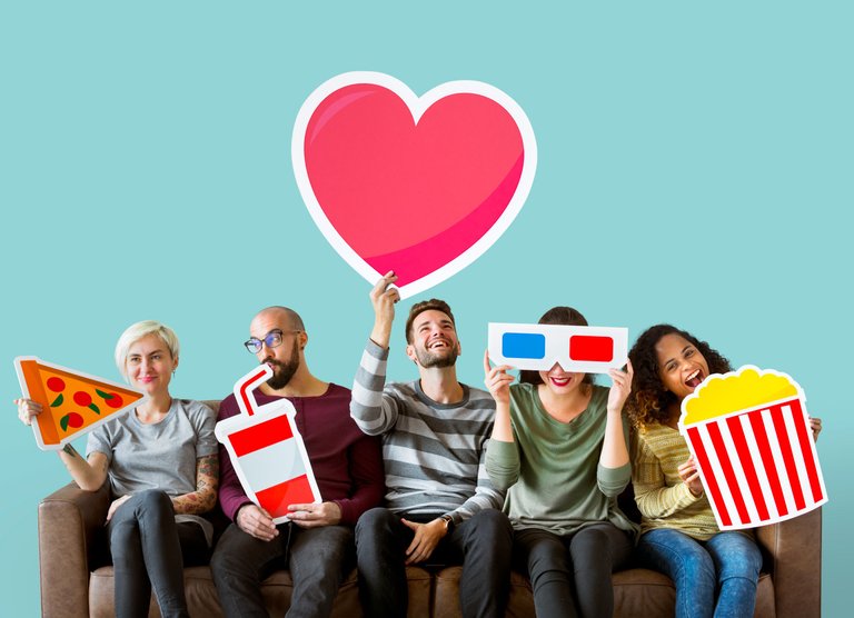 group-of-diverse-friends-holding-movie-emoticons.jpg