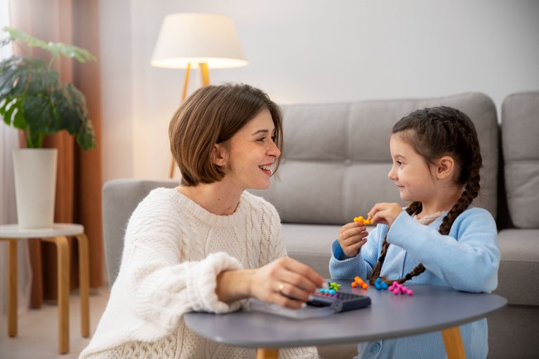 front-view-mother-kid-playing-memory-game.jpg