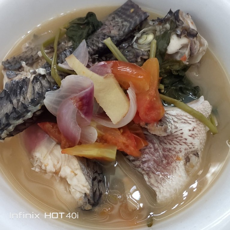 Fishing Equipment And Soup Fish with Calamansi 