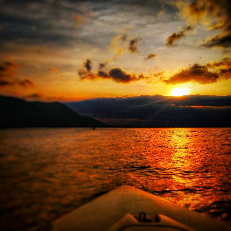 Time to go back - sunset on boat