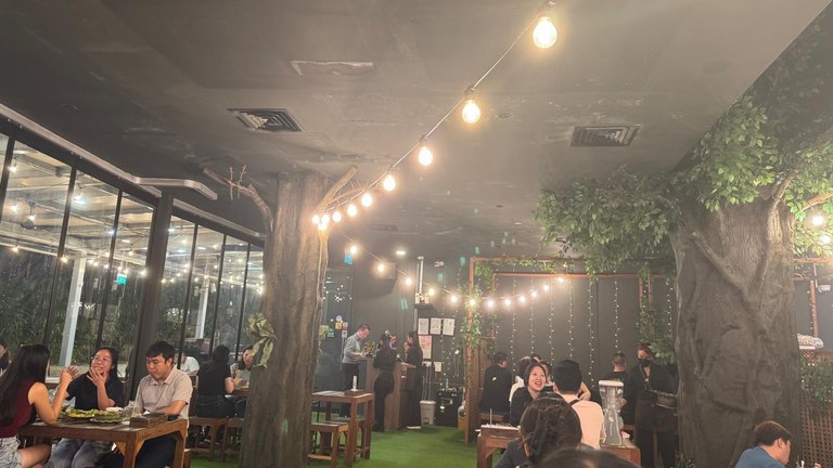 More pictures of the indoor dining area with Thailand night market feel ambience