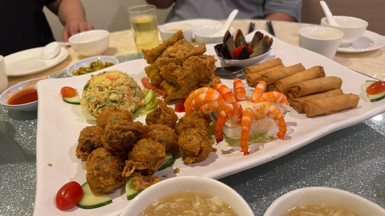 Signature Platter (anti clockwise from bottom left: Handmade Meatball, Salad Prawn, Spring Roll, Century Egg, Crispy Seafood Beancurd Roll, Scrambled Eggs)