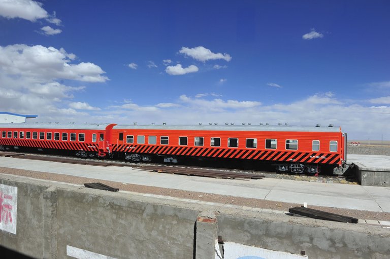 Passing a train depot along the railway