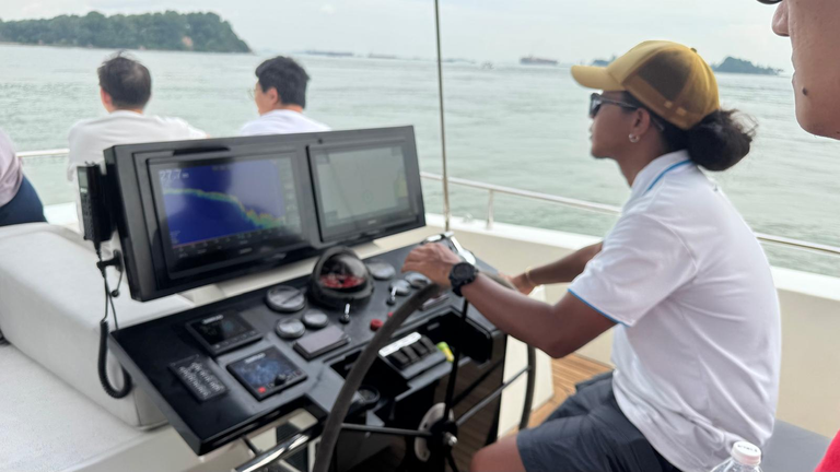 The man in charge of our journey to and fro Lazarus Island