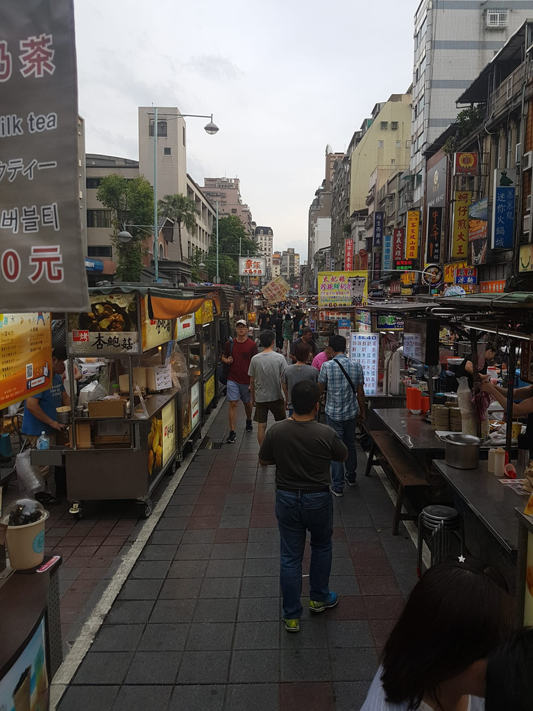 Walking in The Alley of A Night Market