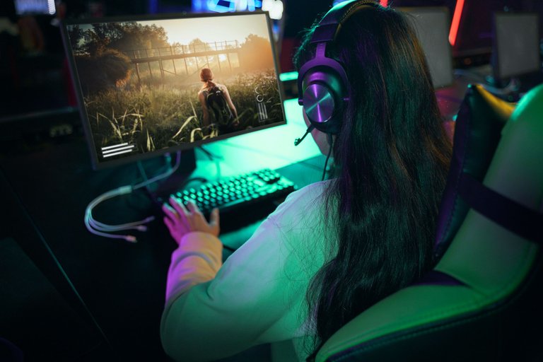 high-angle-woman-playing-videogame-on-computer-3.jpg