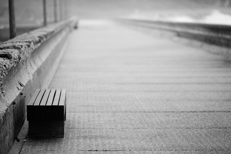 empty bench at stormy day.jpg