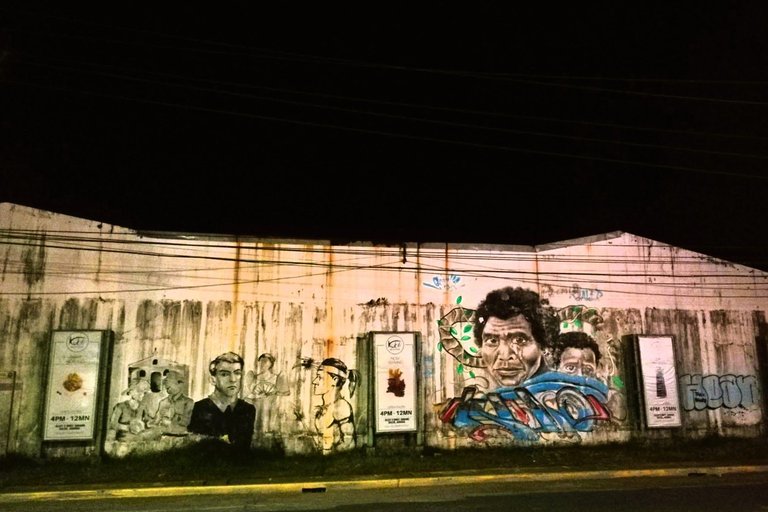 Night Canvas: Stories on a Wall | PhotoFeed Contest - Street Photography Round #126