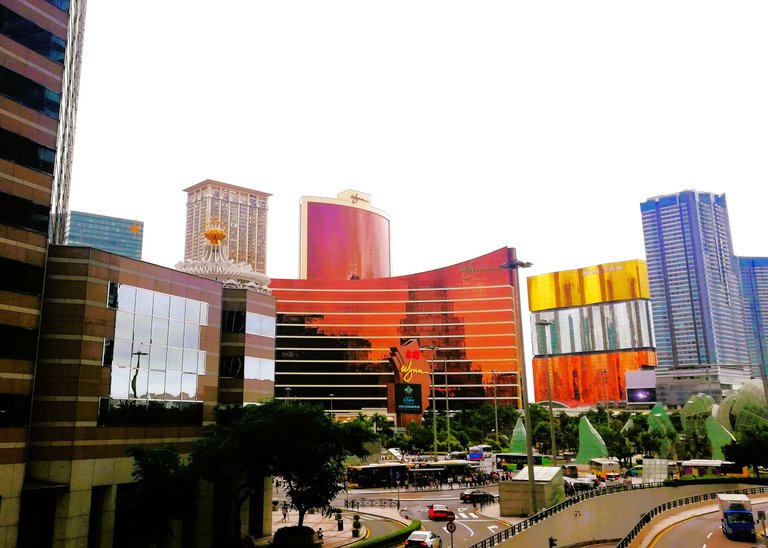 Where Luxury Towers Meet Dynamic City Life | PhotoFeed Contest - Cityscape Photography #128