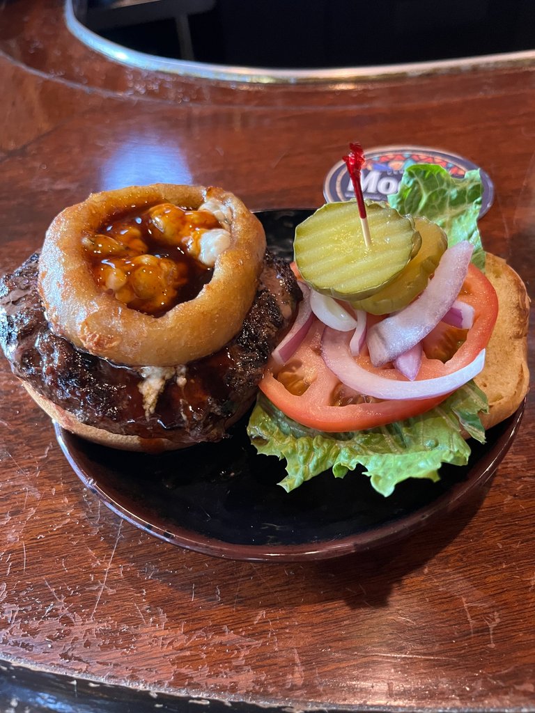 hamburger with onion ring. maybe it was called a texas burger or some kind