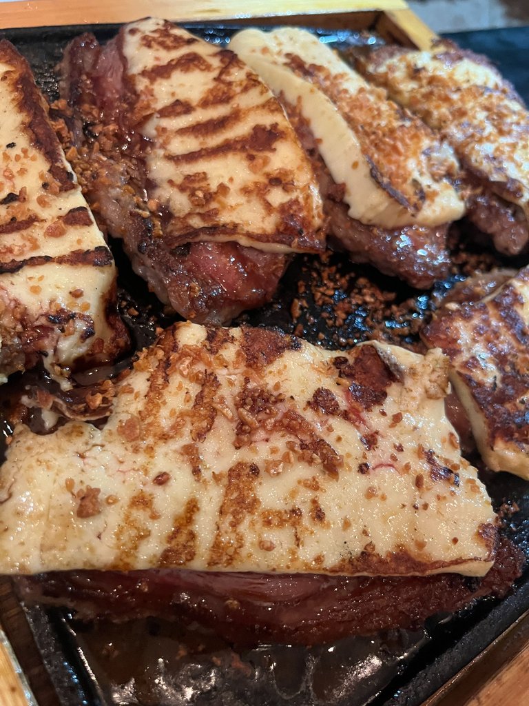 cheese on top of steak