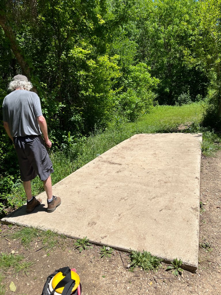 greg noticed that the trapezoidal shape of the tees at this course were placed backwards. he said usually the wider end of the trapezoid is at the end of the tee not the beginning