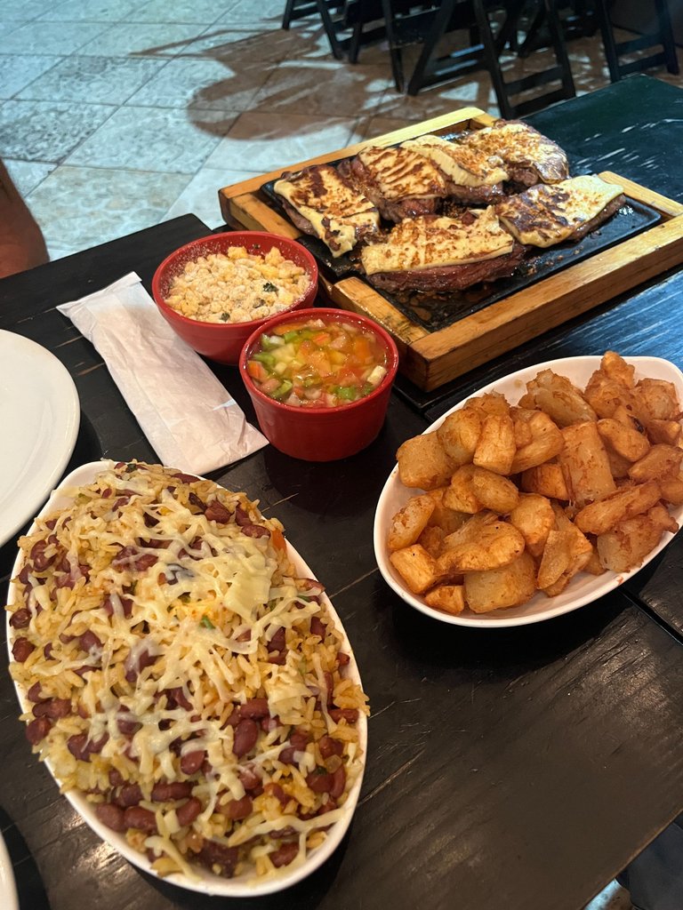 spread of late night food. all so good. those fried roots are Yuca