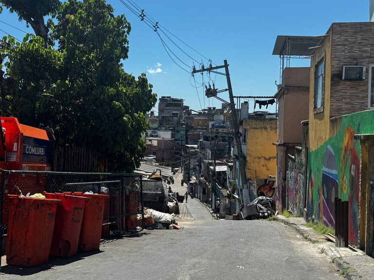 we drove the car up a huge hill and this was the entrance to the favela. 