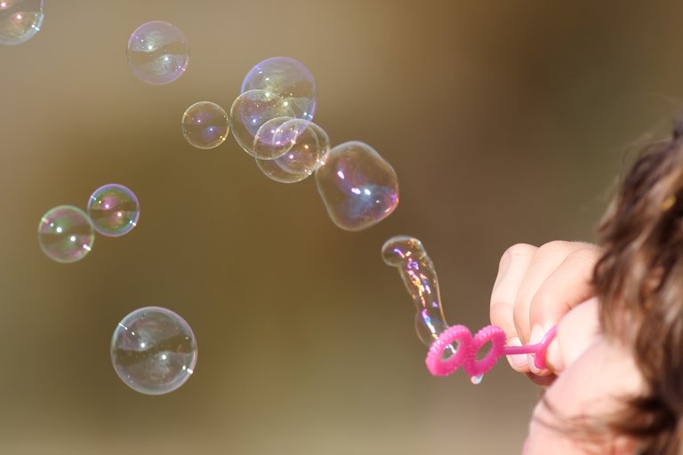Girl_blowing_bubbles-3868407589.jpg