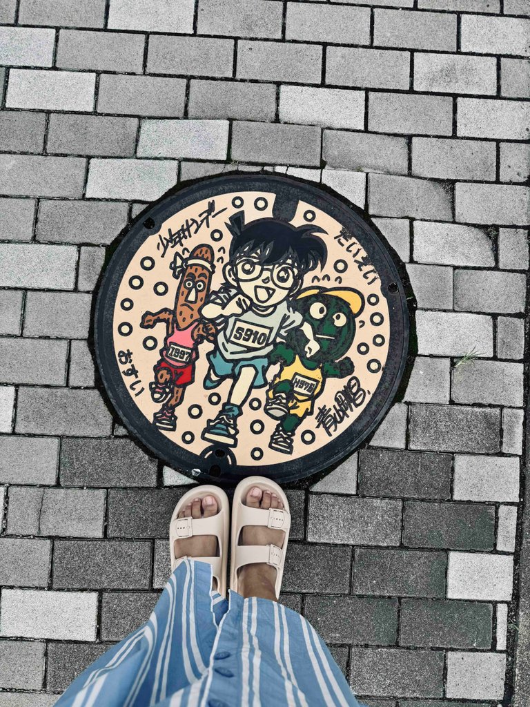 Signed manhole cover?