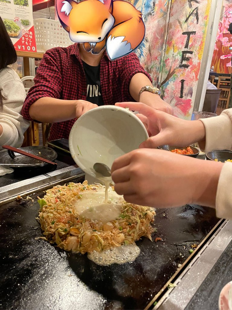 Pouring the liquid ingredient in the middle