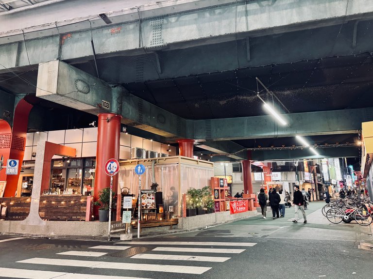 under the train tracks