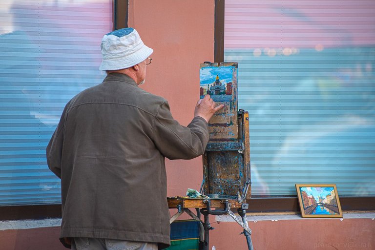 St. Isaac Cathedral in the image of the street painter