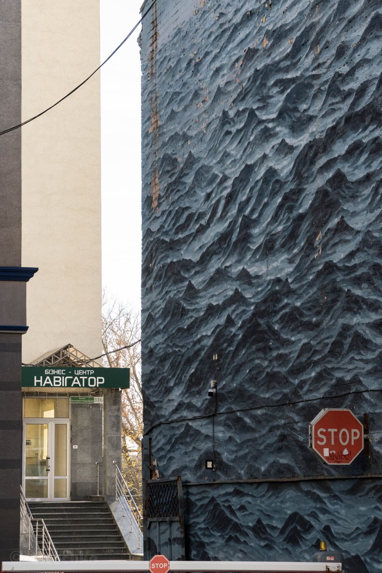 "Black Sea" mural on one of the buildings in Kyiv. And a business center with an aptly titled "Navigator".