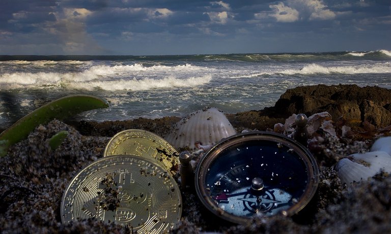 bitcoin in beachsand pixa.jpg