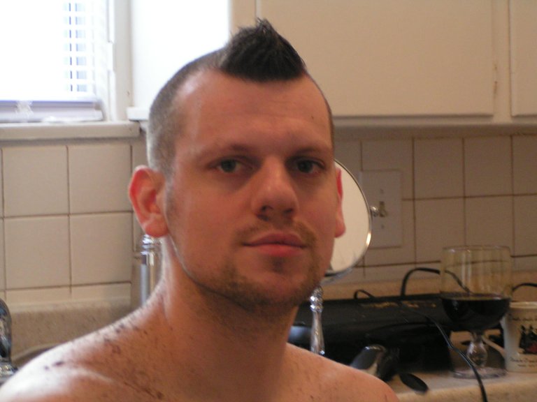I was in the middle of shaving my head a few years ago and left a little piece for shits