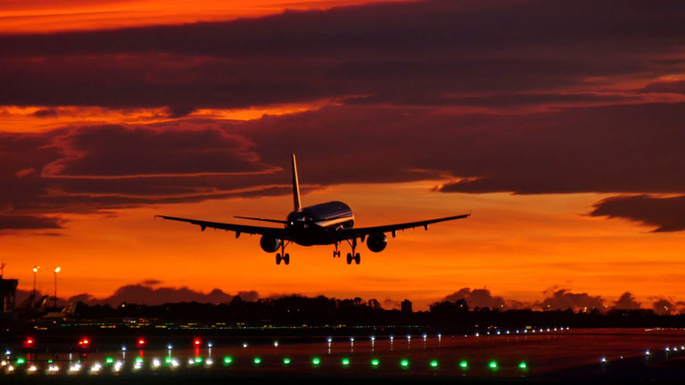commercial-aircraft-landing-at-barcelona-airport-at-sunset-passenger-airplane-landing-under-golden-sky-flying-airplane-approaching-airstrip-aircraft-approaching-landing-at-barcelona-airport-jet-plane-approaching-airstrip_sozelyjp_x_thumbnail-full07.png